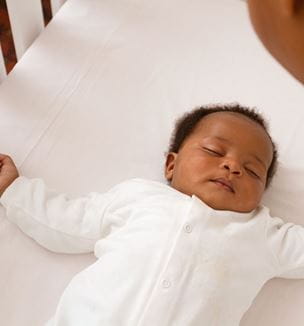 Getty image depicting baby safe sleeping in crib